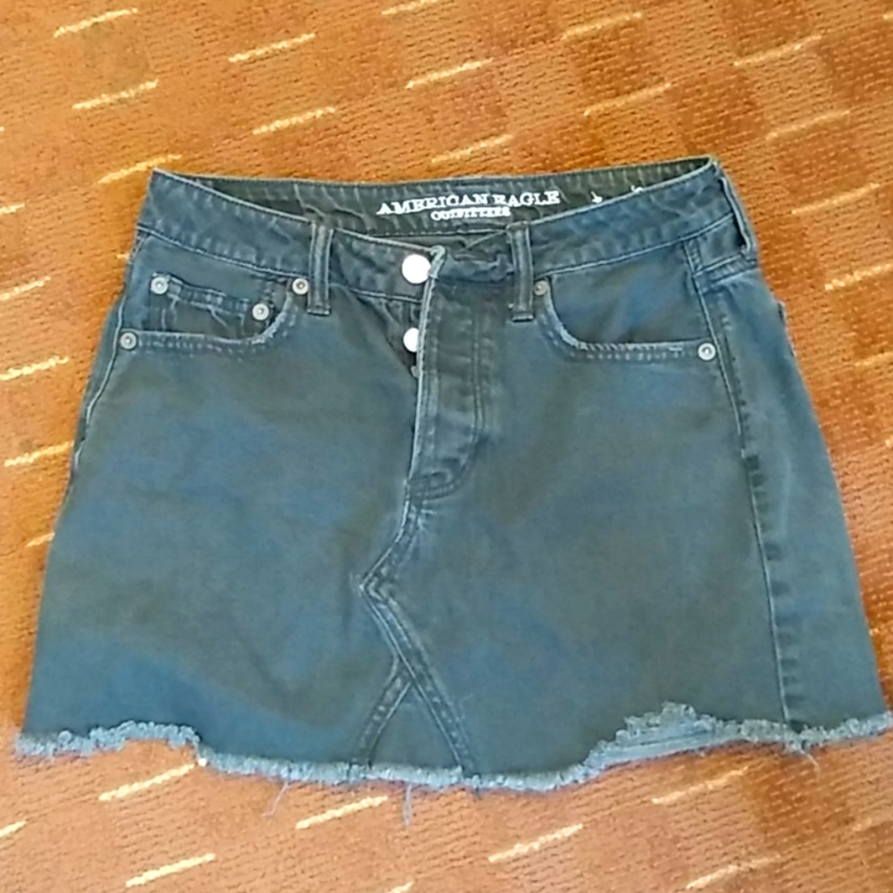 Black denim mini skirt